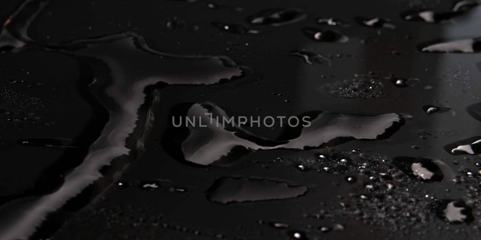 Water drops on black background