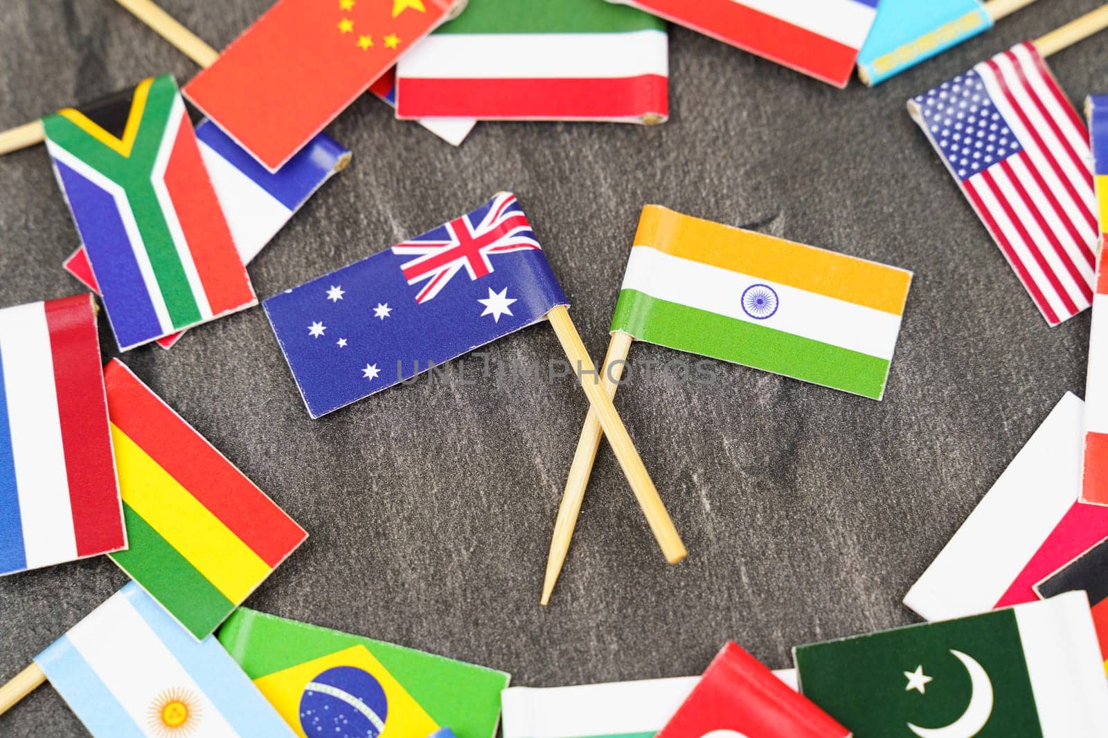 The concept is diplomacy. In the middle among the various flags are two flags - India, Australia by Sd28DimoN_1976