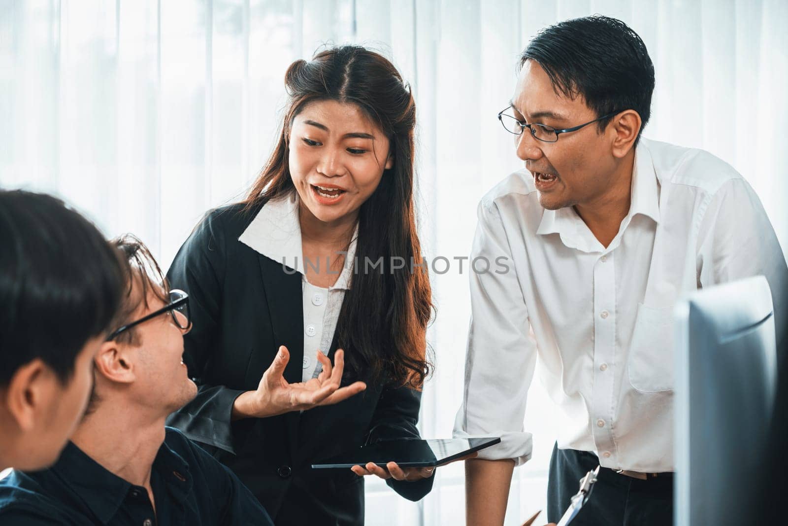 Group of diverse office worker employee working together on strategic business marketing planning in corporate office room. Positive teamwork in business workplace concept. Prudent