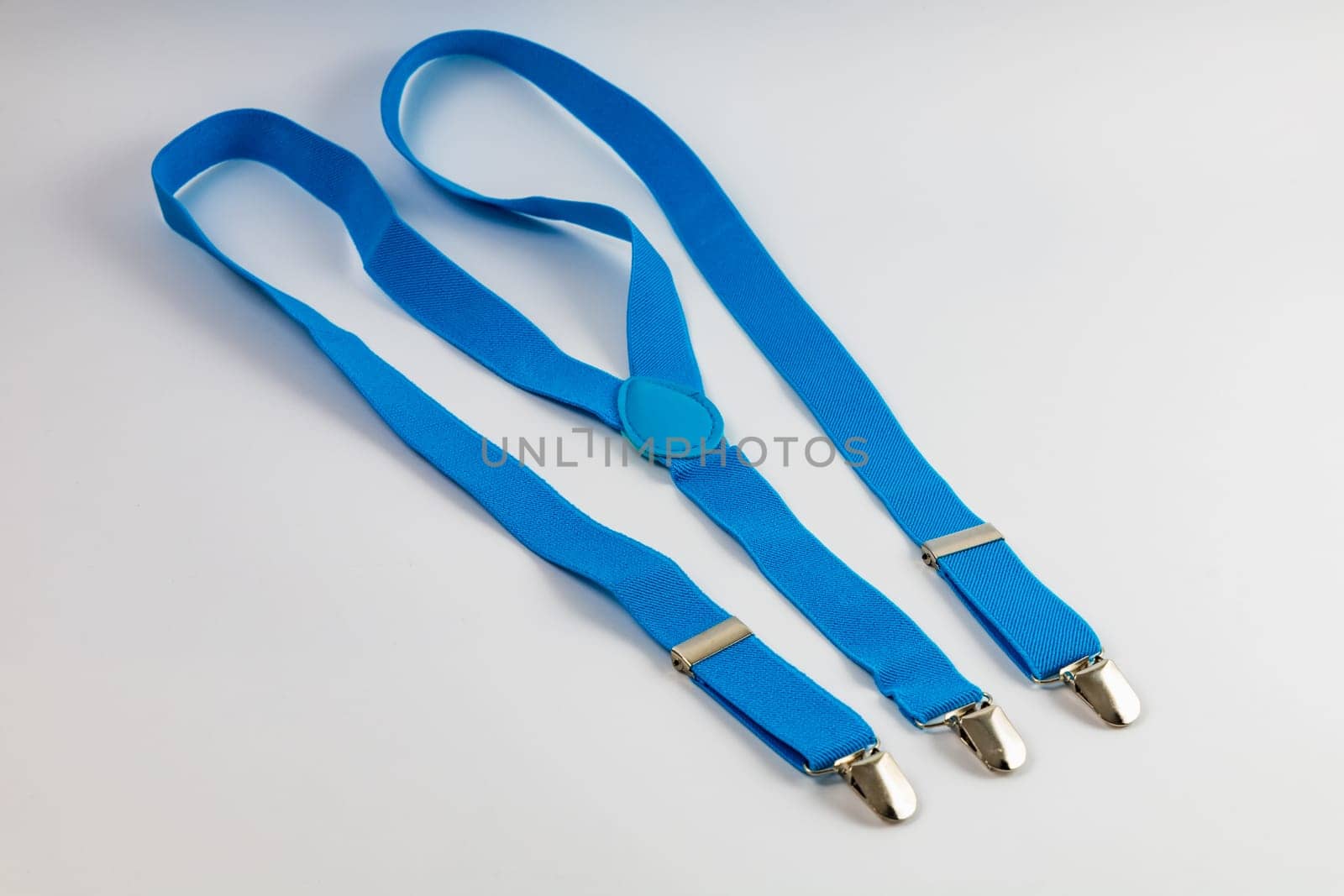 Small and blue trousers suspenders made of elastic fabric by Wierzchu