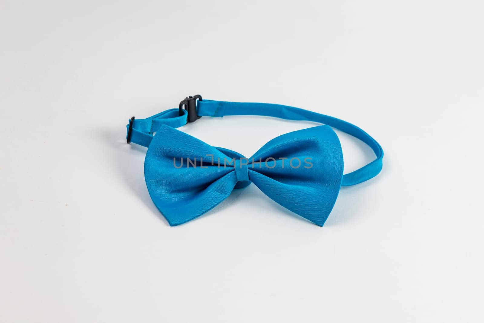 Small and blue bow tie with thin belt and plastic buckle by Wierzchu