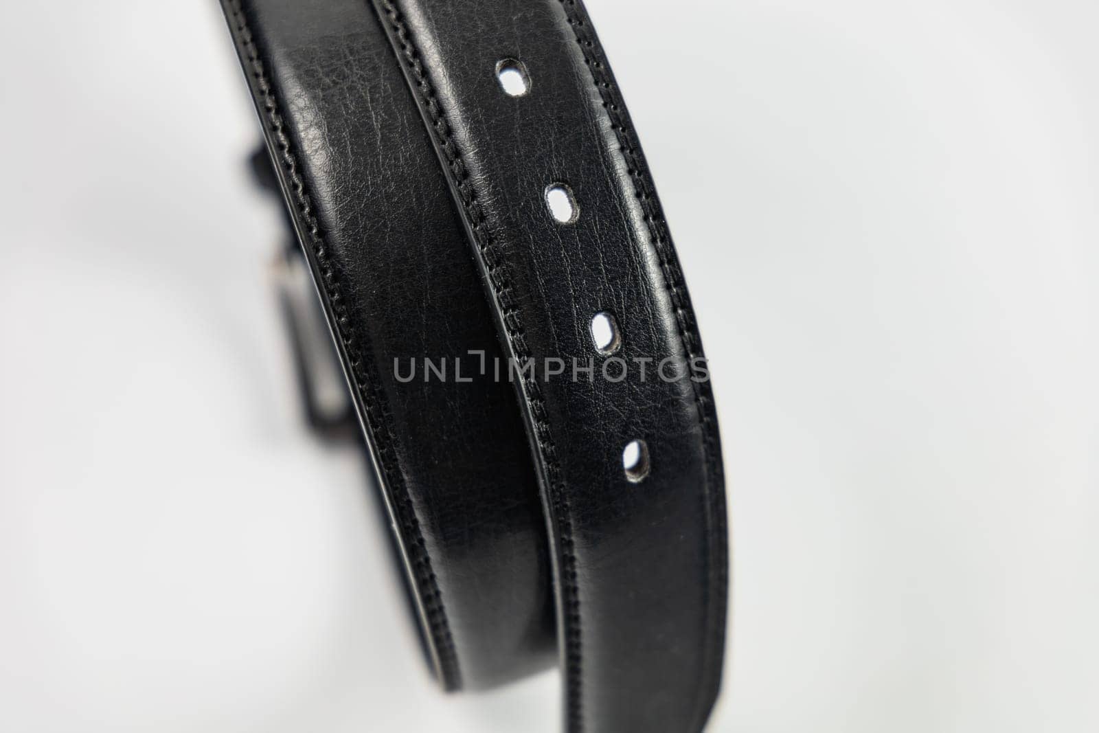 Long and wide black leather belt with few small holes and metallic big buckle by Wierzchu