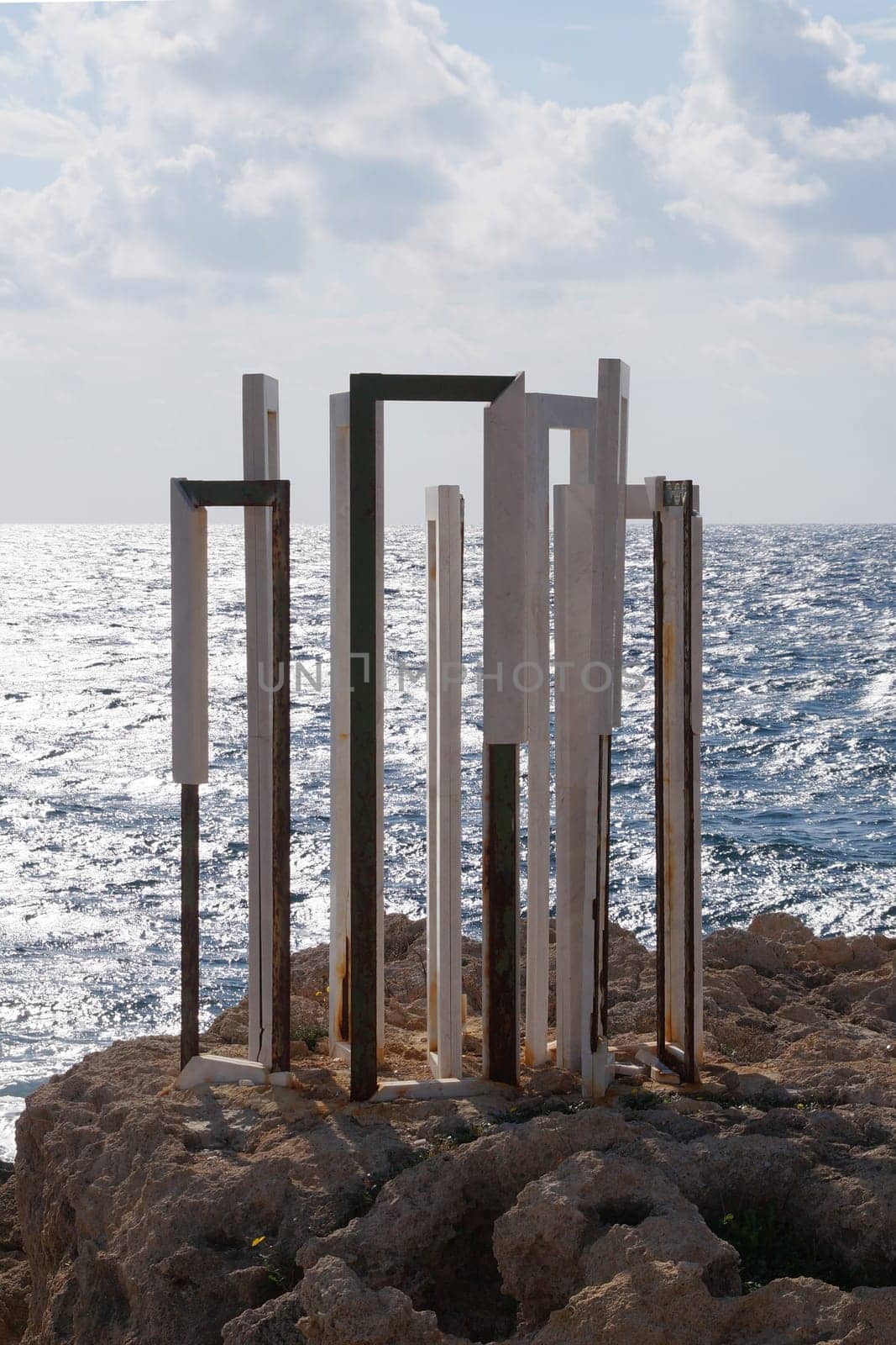 sundial on the shores of the Mediterranean Sea in sunlight by Annado