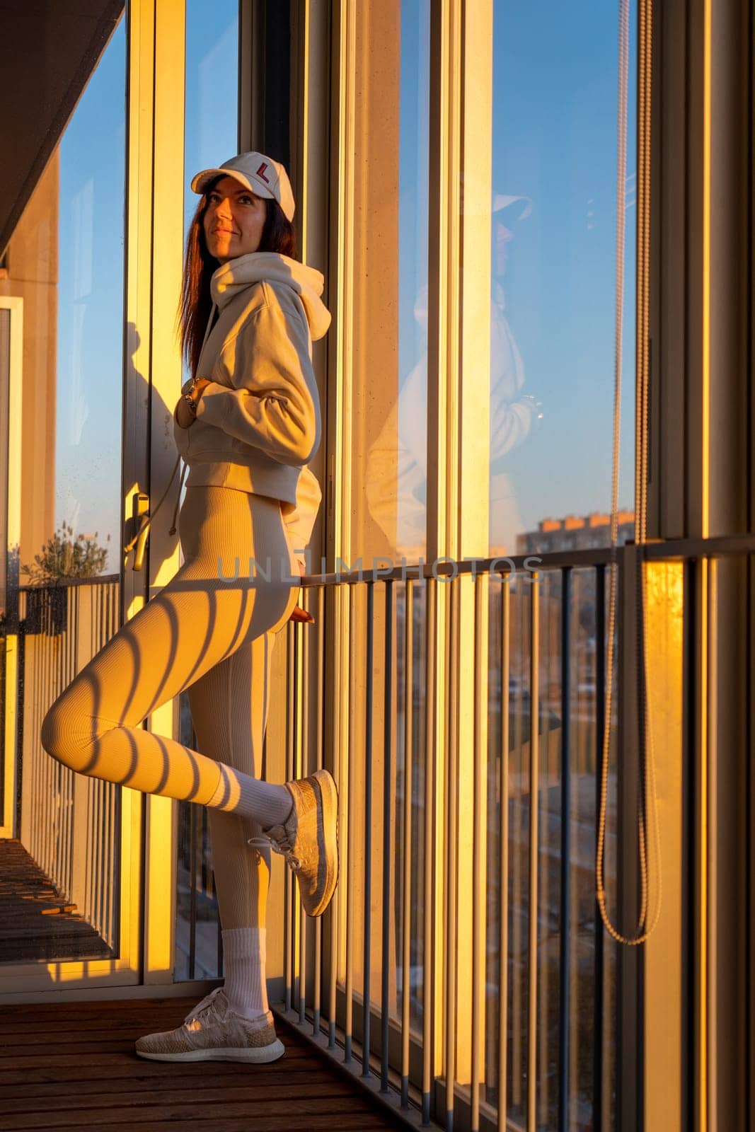 Woman in a balcony in a passive house in Aragon