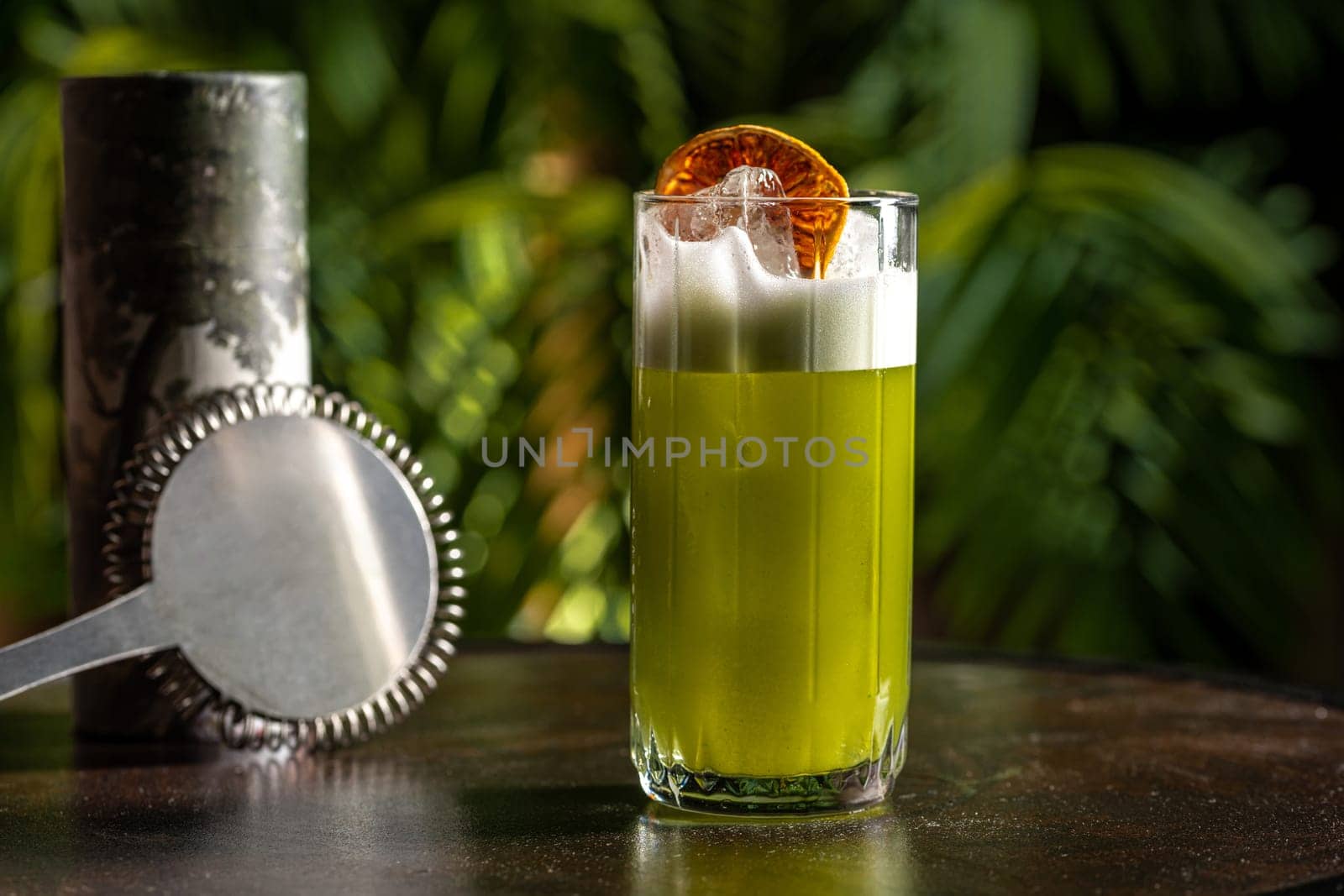 Luxury cocktail on the wooden table on a dark background