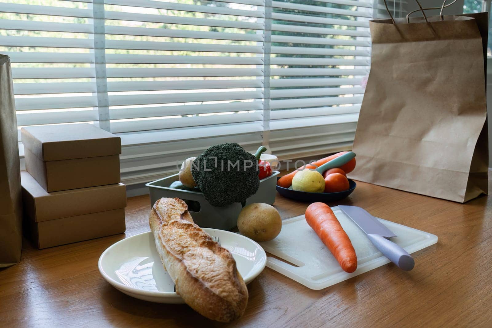 healthy and vegetarian foods background. Vegetables and bread on brown table. Prepare to cook healthy food.