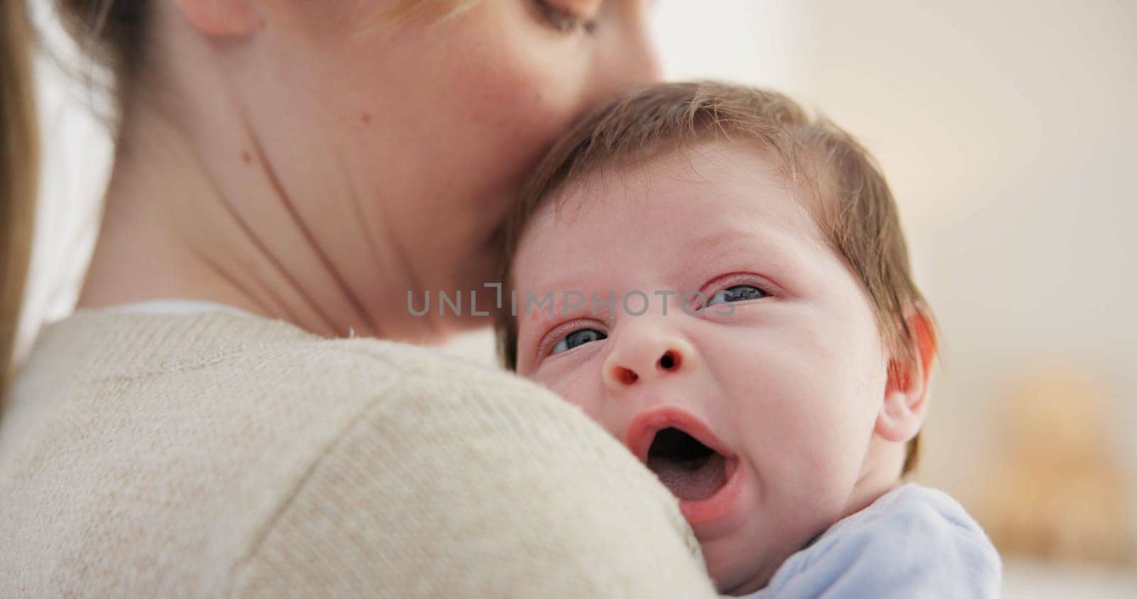 Baby, yawn and calm with tired newborn and mom in a bedroom at morning with care. Rest, relax and young kid with fatigue and mother support in a family home with motherhood in house with bonding.