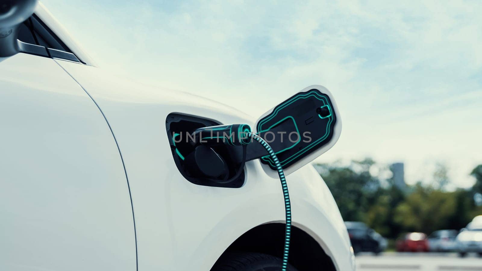 Electric car recharging with EV charger from charging station at public car park. Future innovative rechargeable EV car using alternative clean and sustainable energy. Peruse