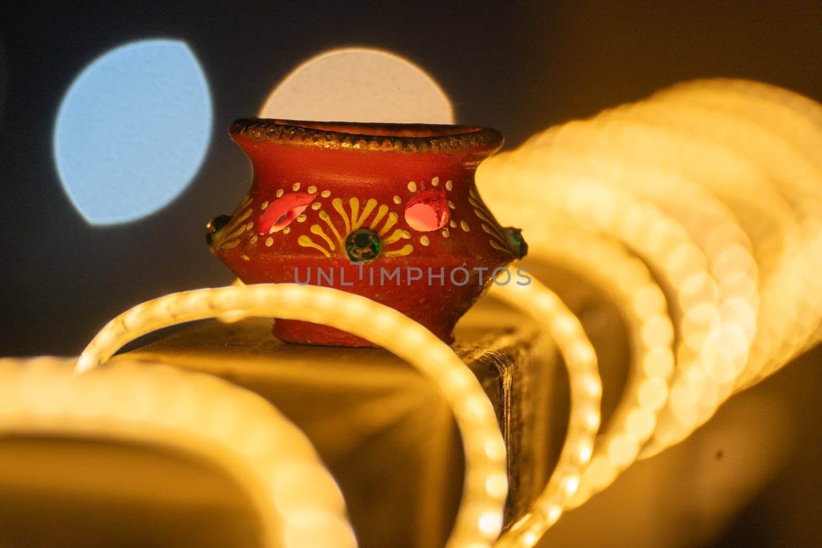 beautifully decorated diyas surrounded by light loops lit on the eve of diwali and the Ram temple Pran Pratishtha consecration celebrated across India and globally by Shalinimathur