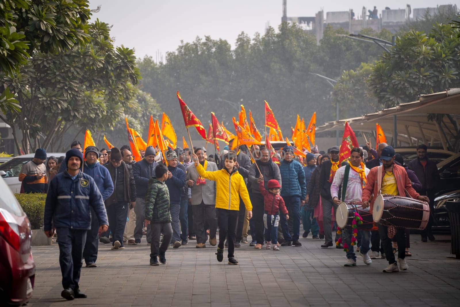 Delhi India - 22nd Jan 2024:Huge crowd of hindu devotees people enjoying early morning shobha yatra walk on the Pran Pratishtha conscecration of Ram temple in Ayodhya