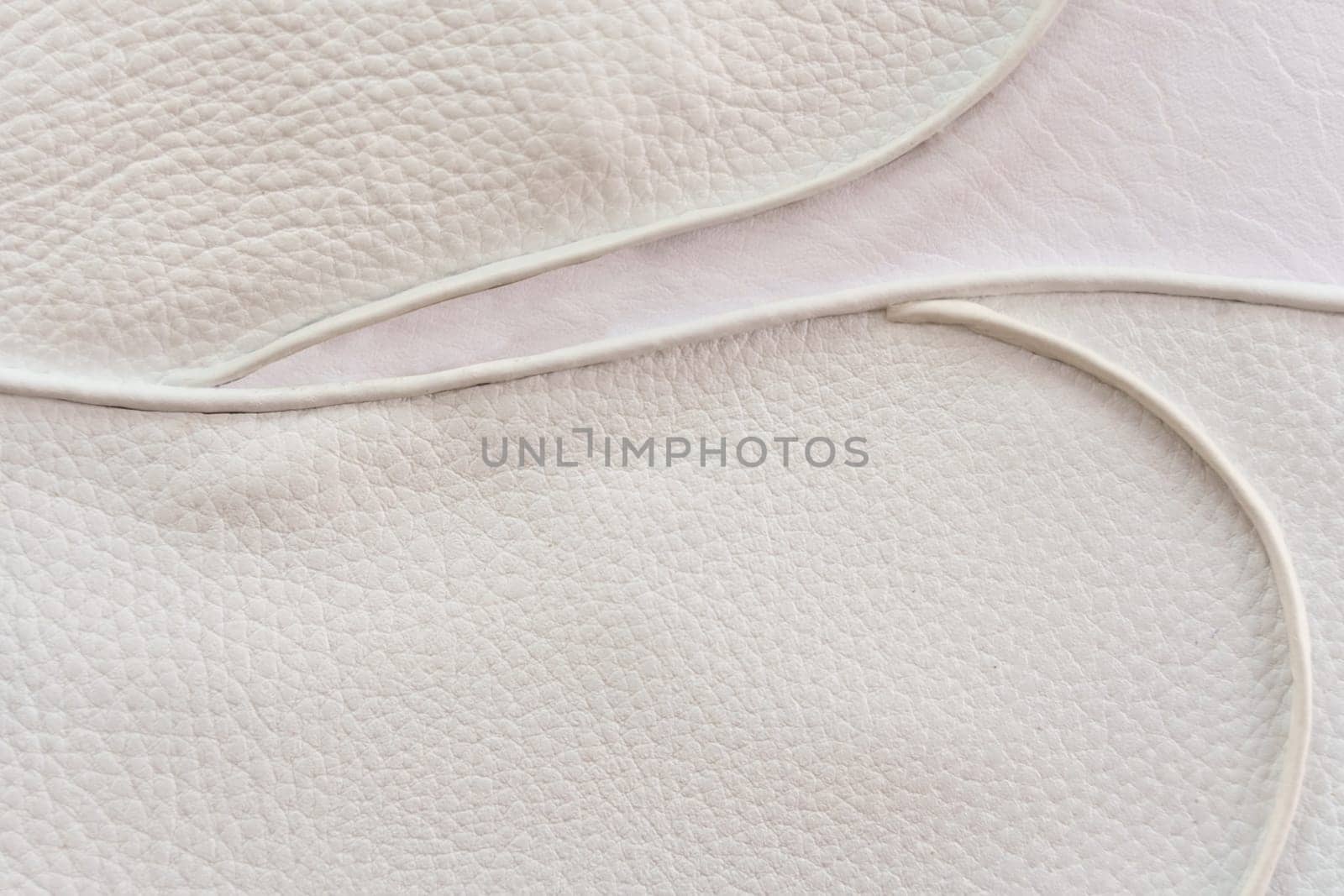White leather texture with patterned stitching, used as a luxurious classic background. by Sd28DimoN_1976