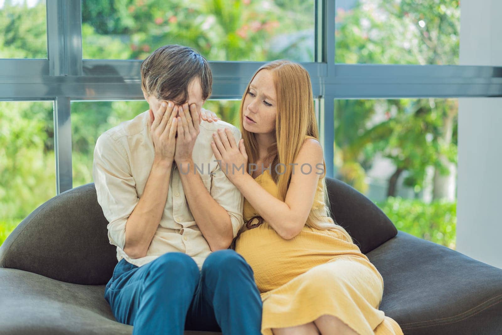 Concerned husband anxiously worries about his wife's pregnancy, seeking reassurance and support by galitskaya