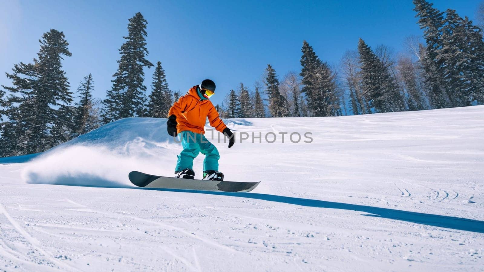 Snowboarder sliding down the hill by Costin