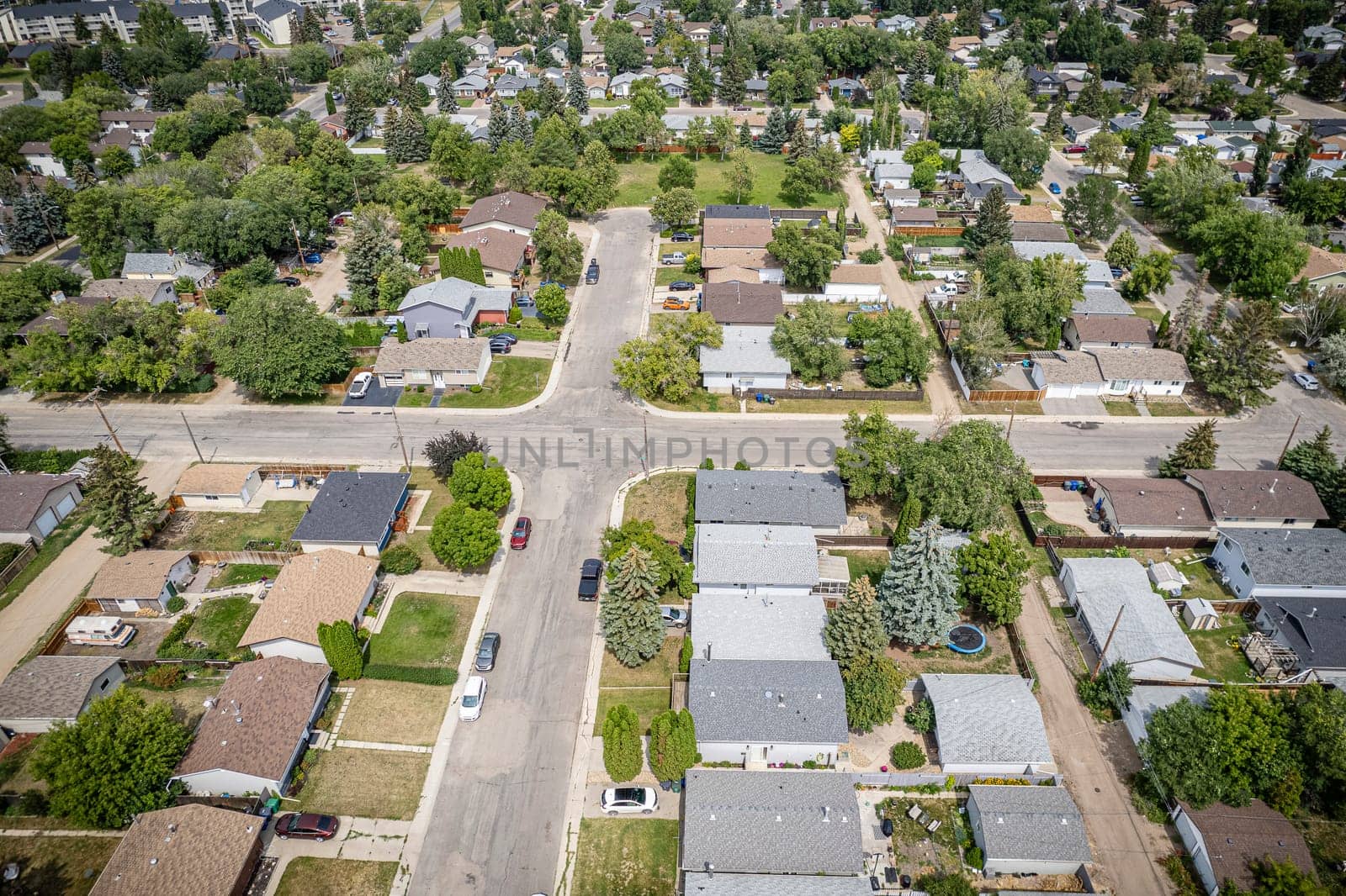 Drone image capturing Forest Grove, Saskatoon, with its lush greenery and residential charm.