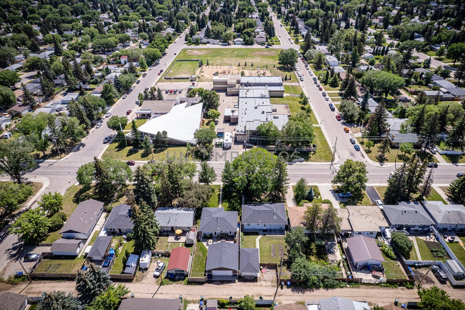 Drone image showcasing the charm of Haultain, Saskatoon, with its residential areas and green spaces.