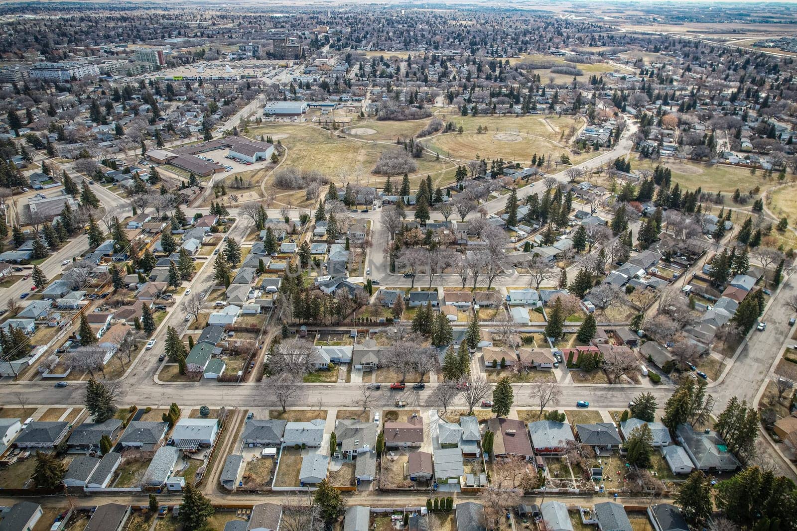Drone image of Nutana Park, Saskatoon, highlighting its serene residential areas and lush green spaces.