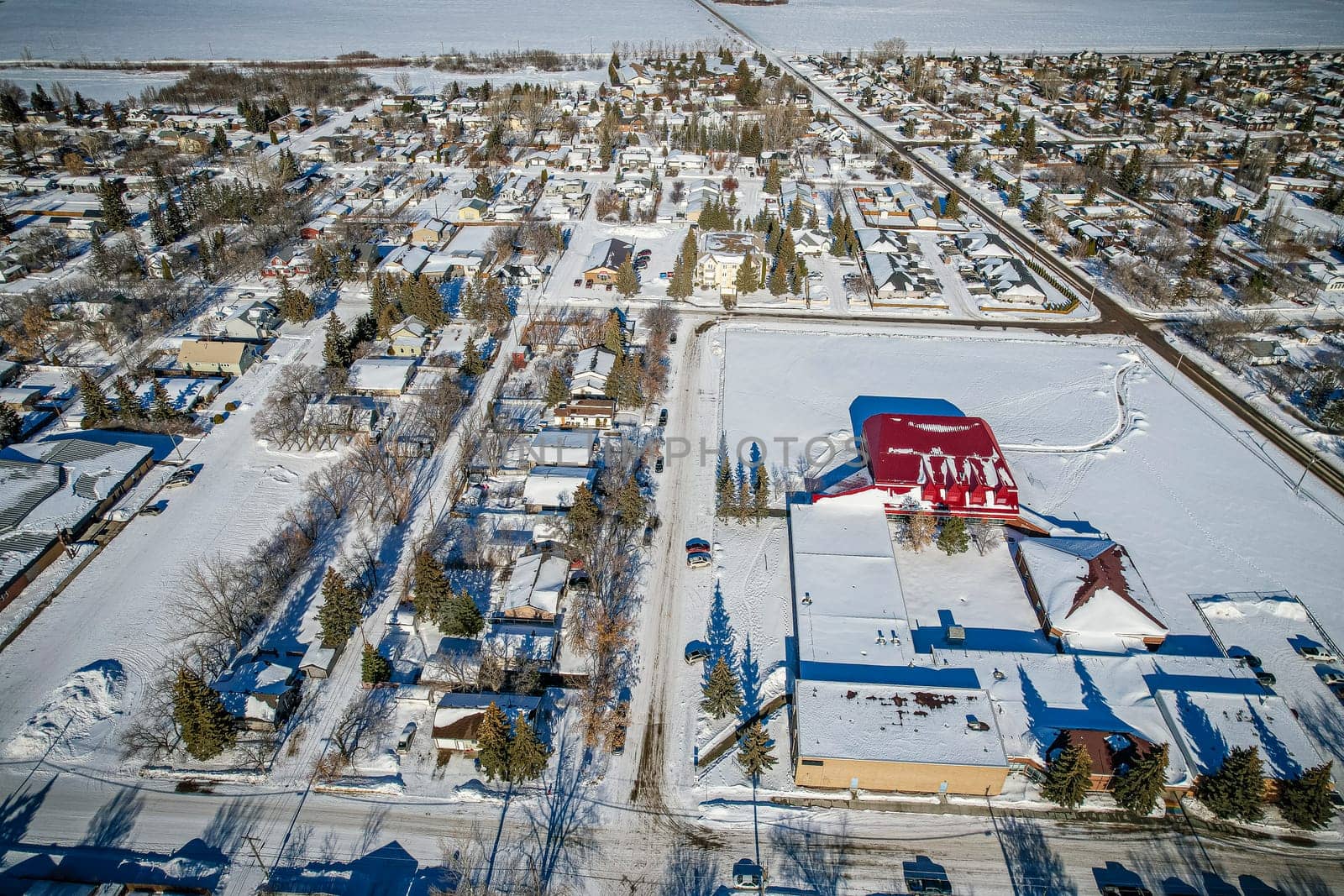Drone image capturing the town of Dalmeny in Saskatchewan, showcasing its charming suburban setting and community atmosphere.