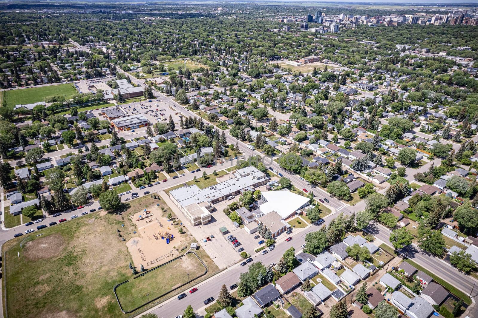 Drone image showcasing the charm of Haultain, Saskatoon, with its residential areas and green spaces.