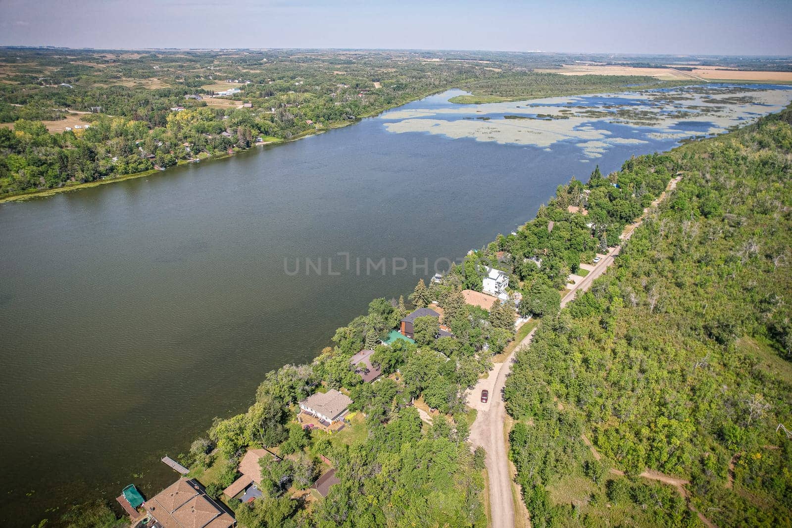 Drone image capturing the natural beauty of Pike Lake in Saskatchewan, showcasing its tranquil waters and scenic surroundings