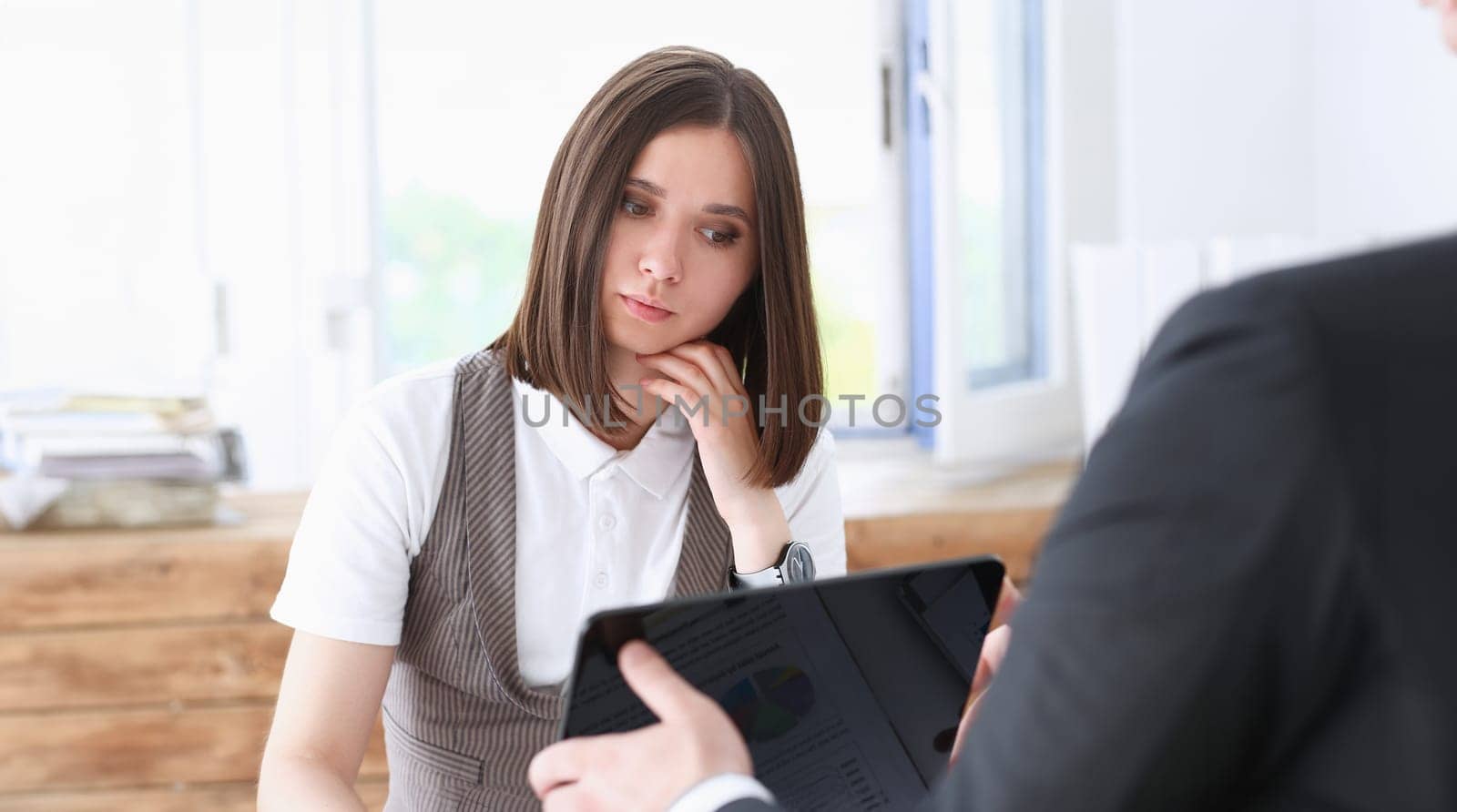 Businesswoman look at tablet pc in office information