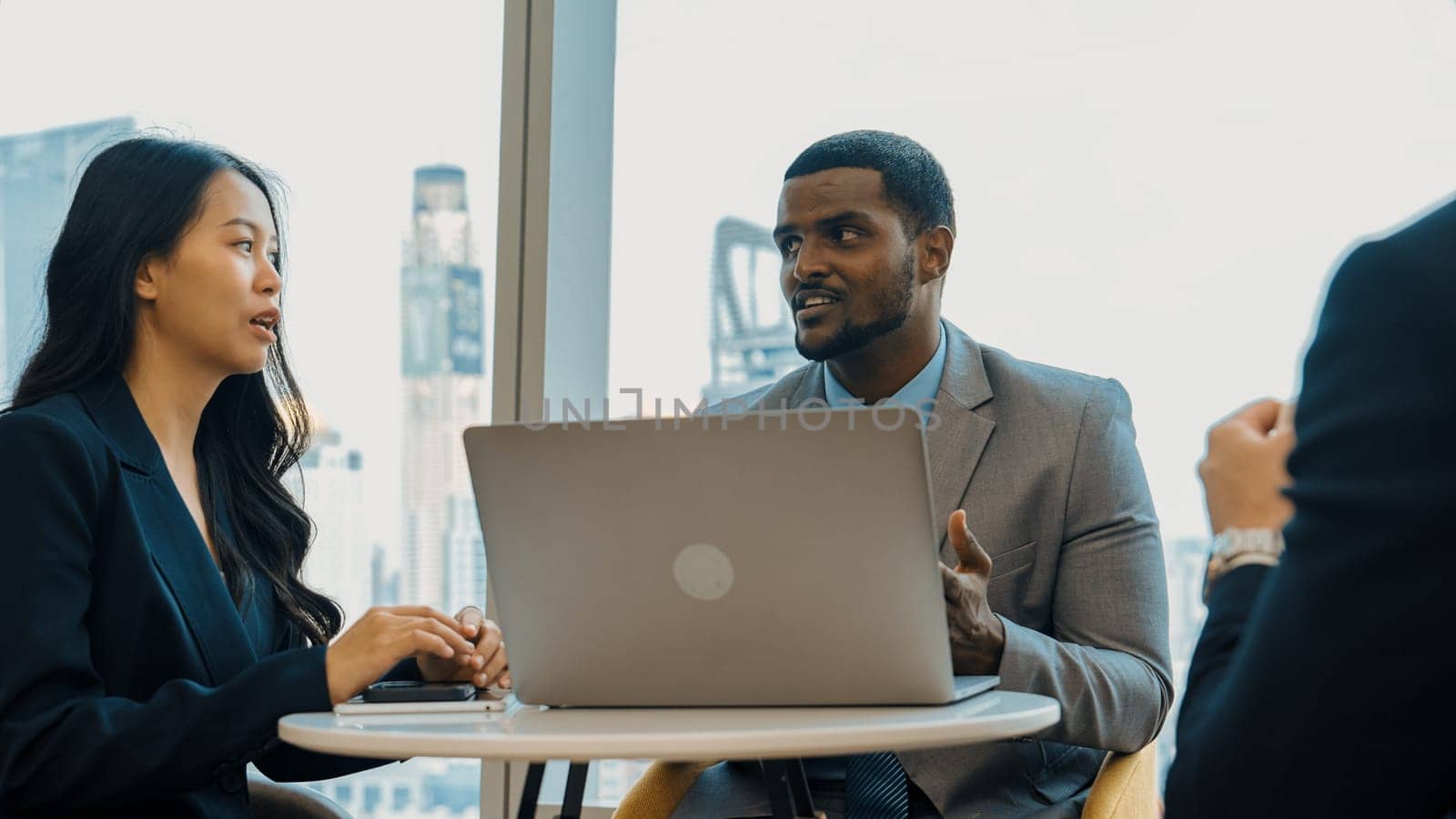 Ornamented office overlooking city skyline, diversity corporate professional discuss ambitious business expansion or strategic marketing. Financial advisor give consulting business insights and idea