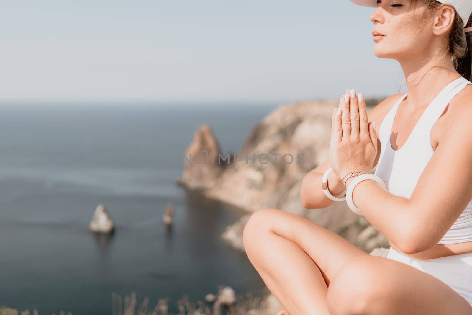 Fitness woman sea. Outdoor workout on yoga mat roller in park near to ocean beach. Female fitness pilates yoga routine concept. Healthy lifestyle. Happy fit woman exercising with rubber band in park. by panophotograph