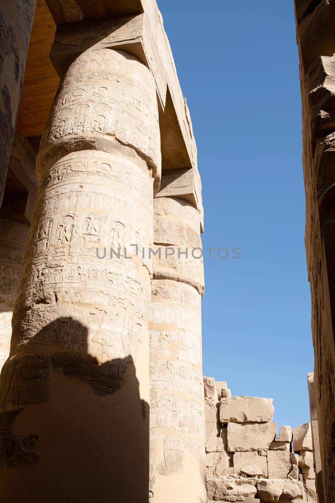 the ruins of the ancient Karnak temple in the city of Luxor in Egypt. by Desperada