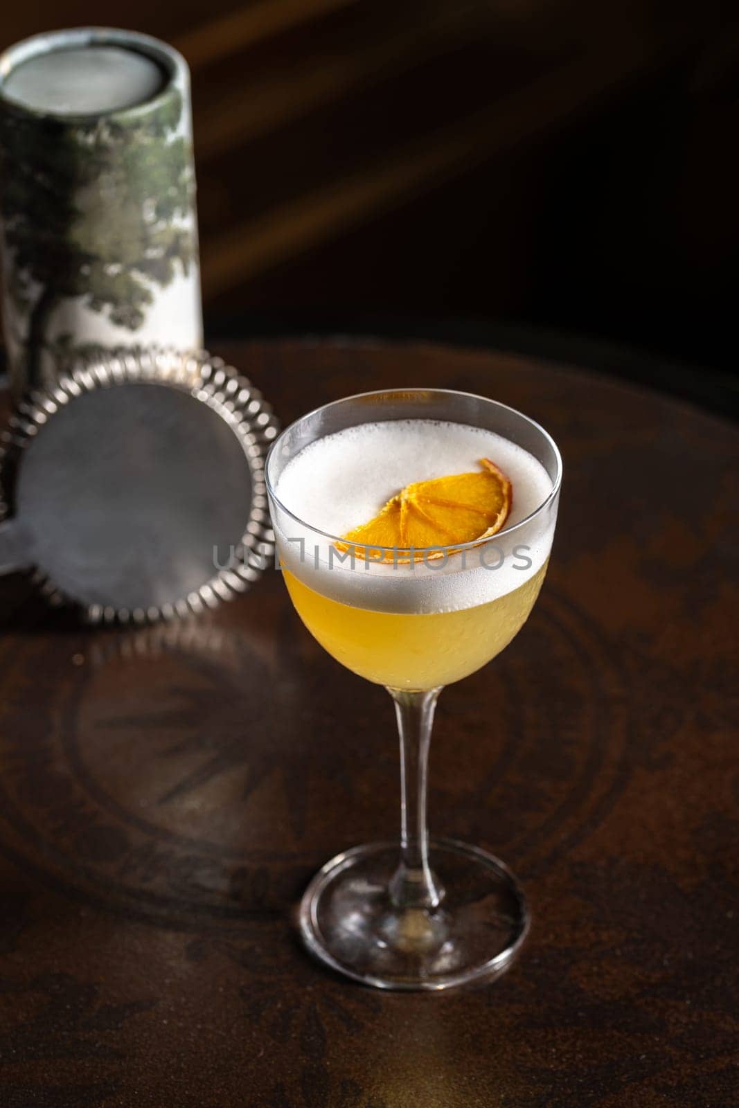 Luxury cocktail on the wooden table on a dark background