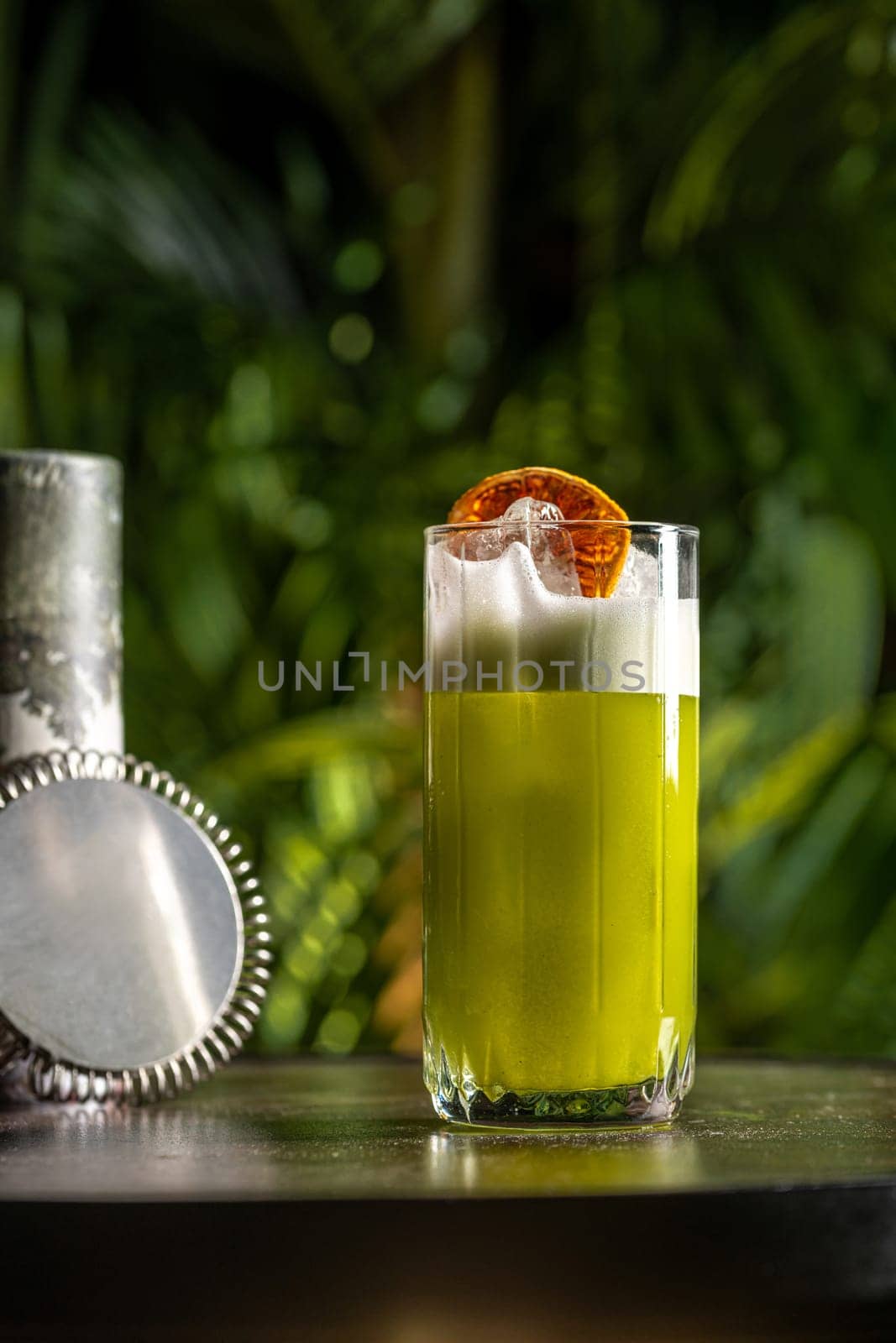 Luxury cocktail on the wooden table on a dark background