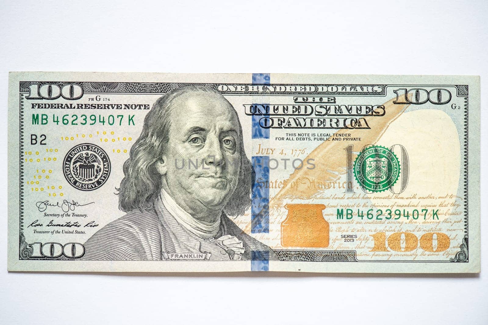 US 100 dollars banknote on white background by OleksandrLipko