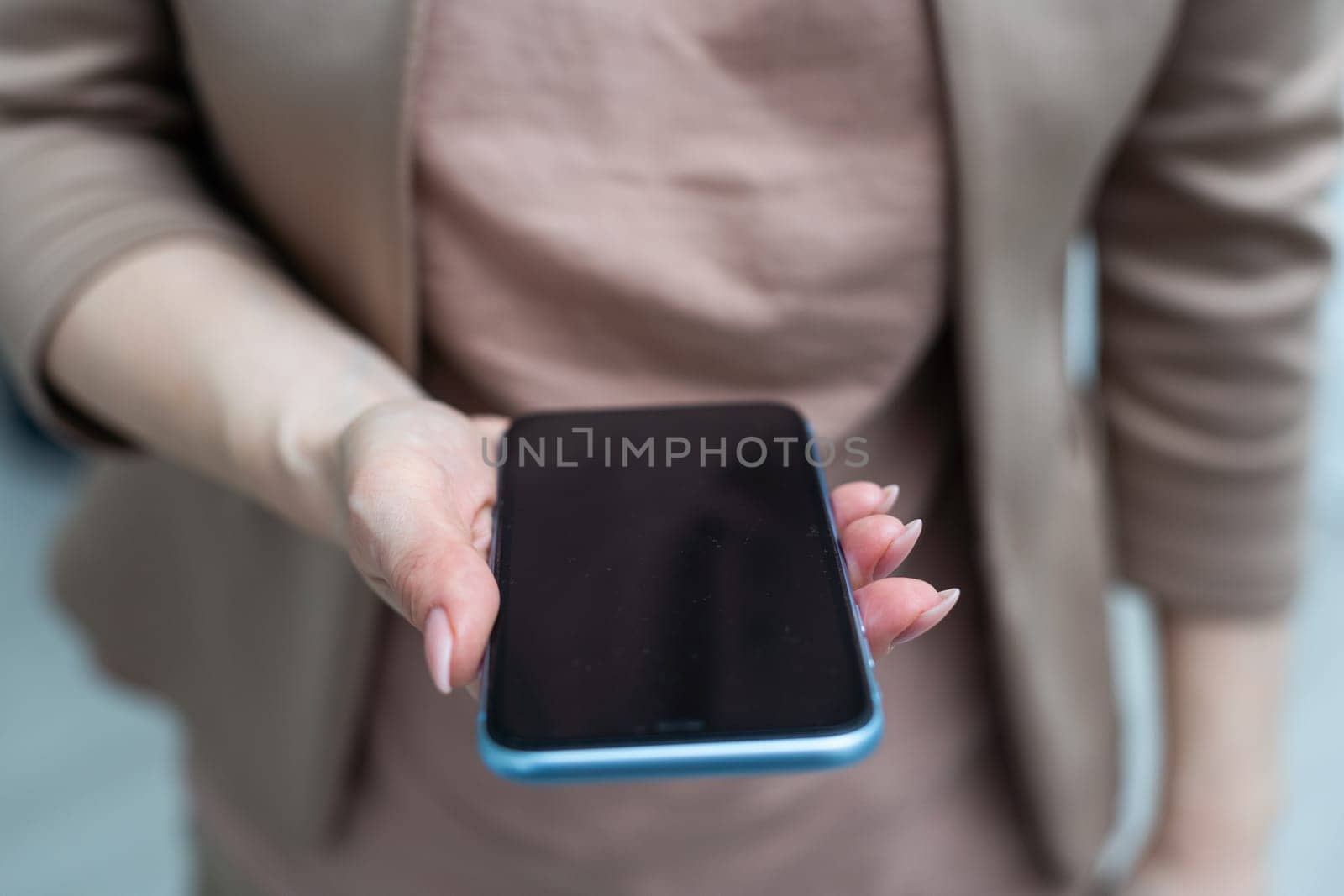 business woman touching the mobile phone. High quality photo