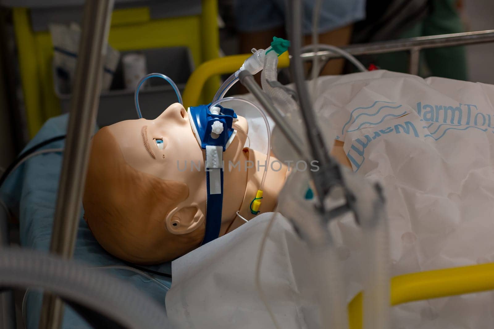 Moscow, Moscow region, Russia - 03.09.2023:Medical training dummy with ventilation equipment in an ICU setting by Zakharova