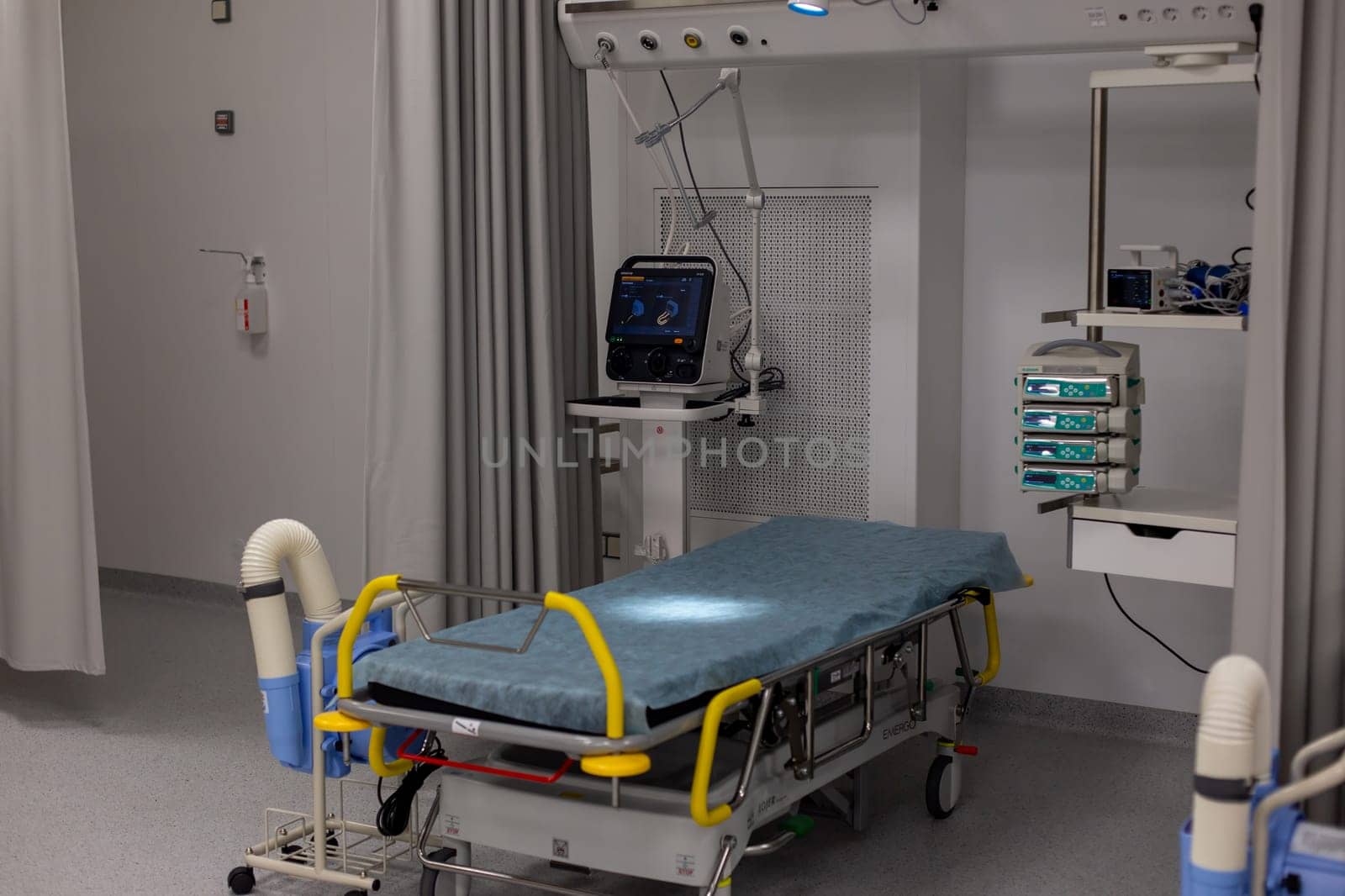 Moscow, Moscow region, Russia - 03.09.2023:Medical patient bed and advanced equipment in a contemporary hospital room by Zakharova
