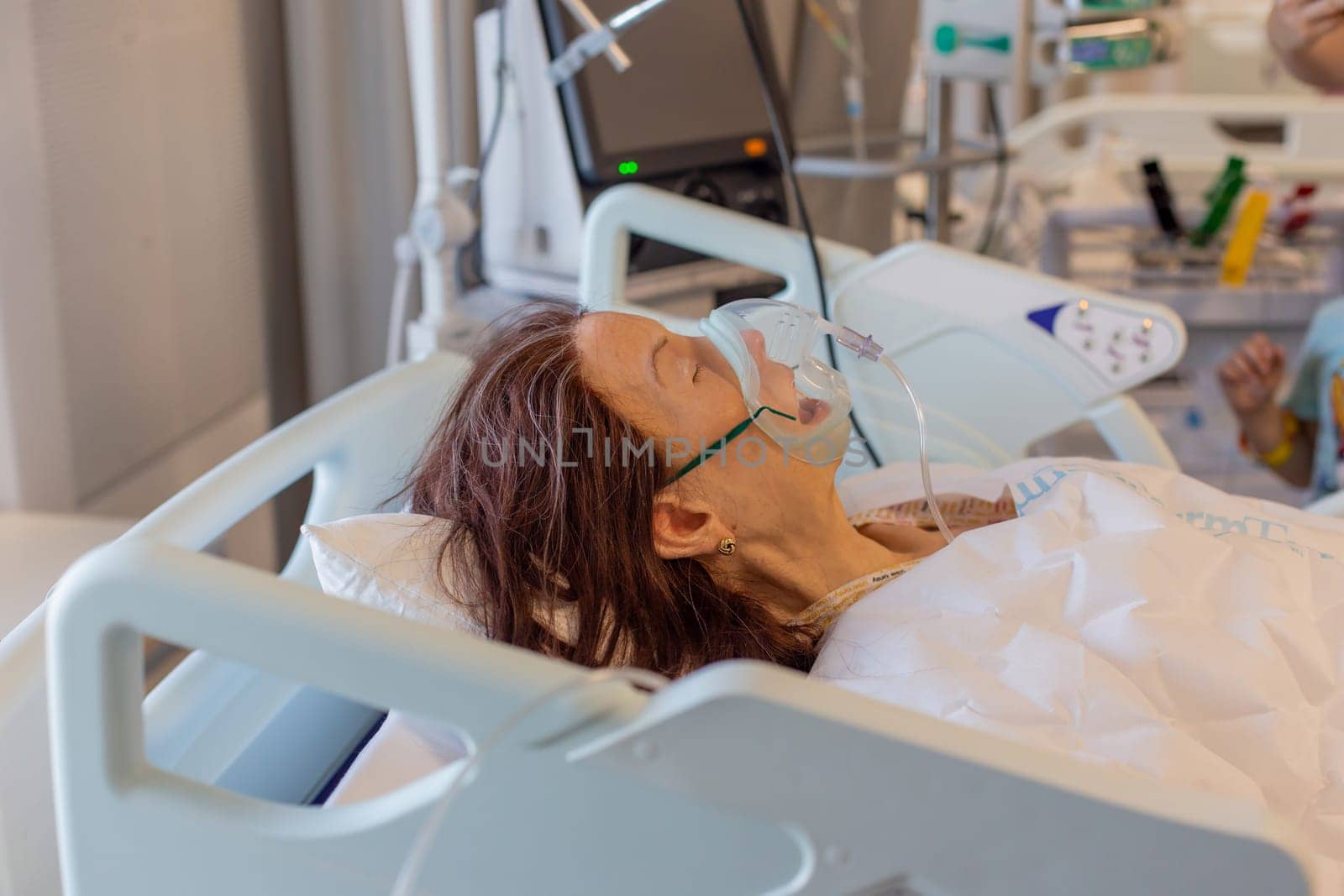 Moscow, Moscow region, Russia - 03.09.2023:Training educational realistic medical mannequin of a senior woman lying on a hospital bed.