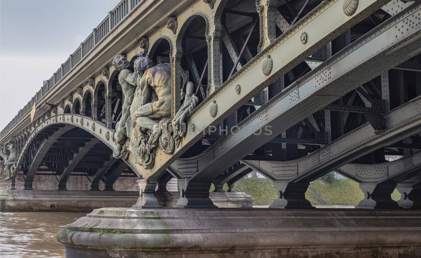 France, Paris - Jan 04, 2024 - Detail of Sculptures decorating the two level bridge Bir Akime (Pont de Bir-Hakeim steel bridge) across the Seine River in Paris. Destinations in Europe. Space for text, Selective focus.