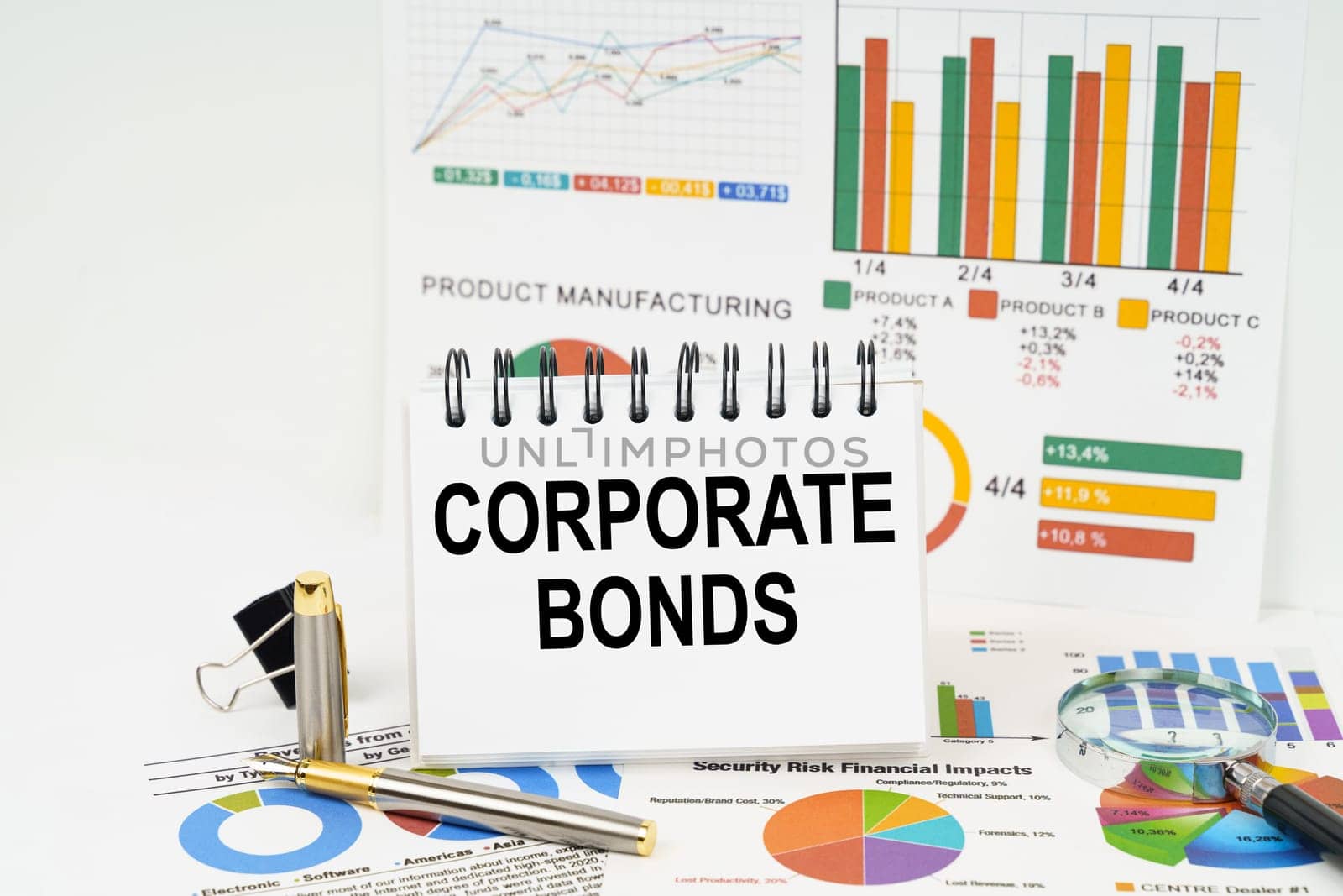 On the table are reports with graphs and a notepad with the inscription - Corporate Bonds by Sd28DimoN_1976