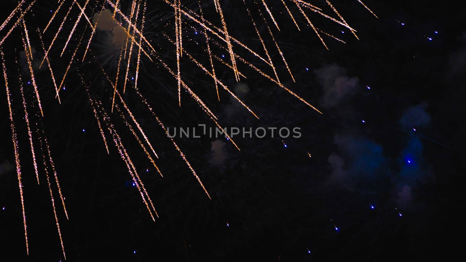 Elements of an explosion of fireworks in the night sky