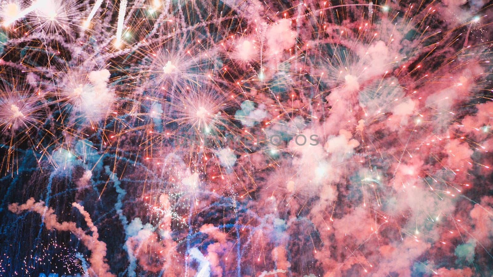 A colourful explosion of fireworks in the night sky