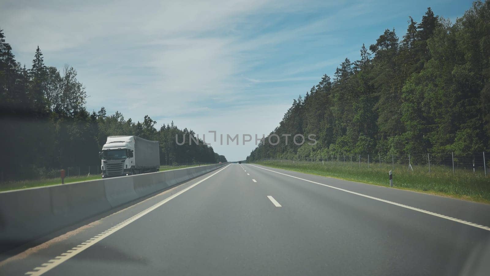 Traffic on the intercity highway. by DovidPro