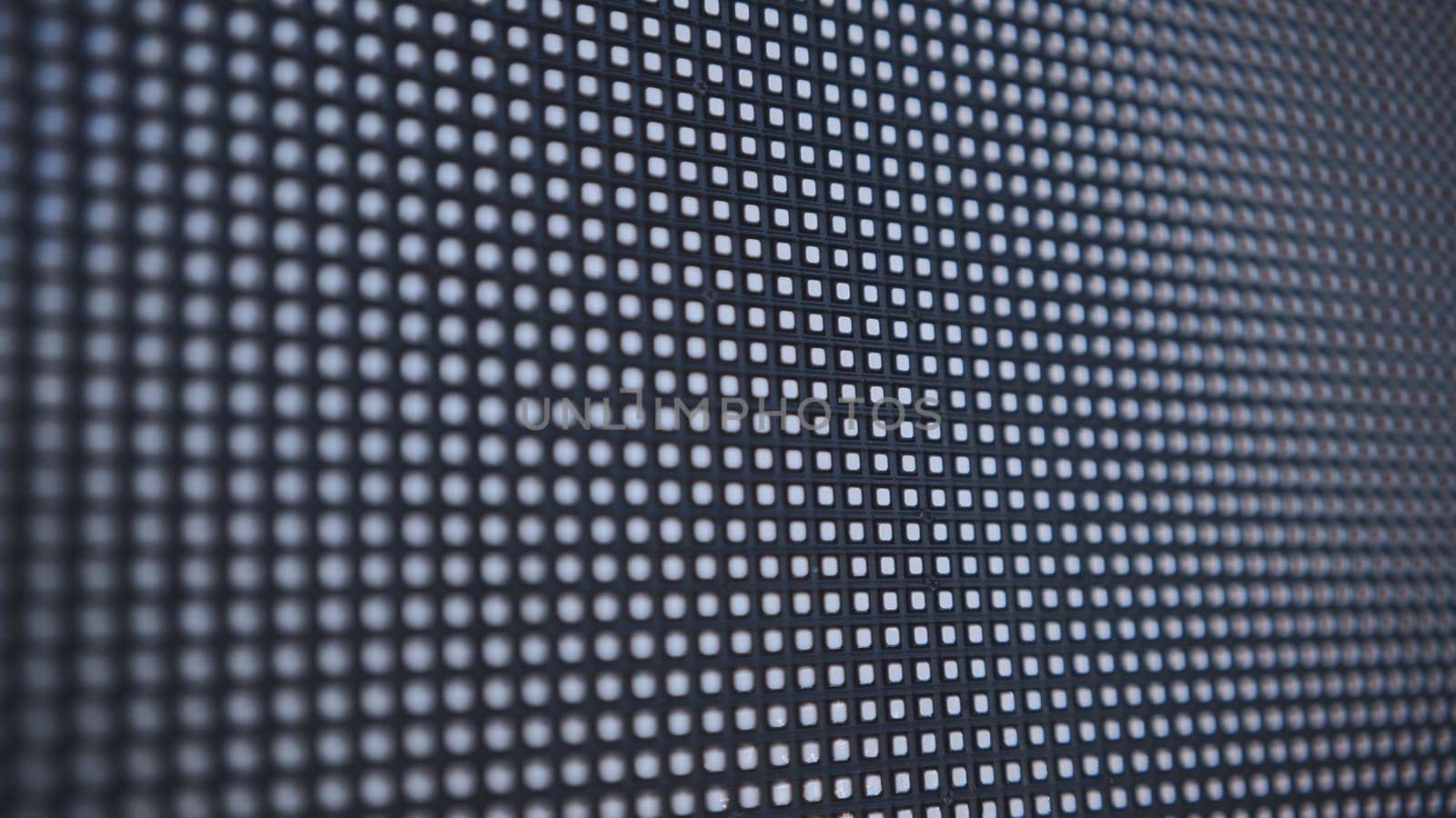 LED screen in operation outside. Close-up view. by DovidPro