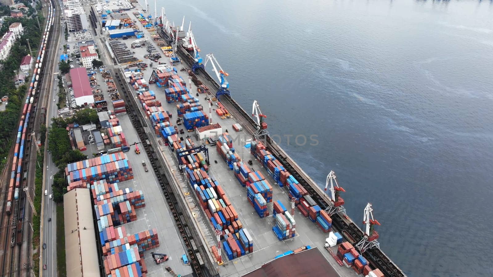 Top view. Vladivostok Commercial Sea Port. Industrial port with containers in Vladivostok