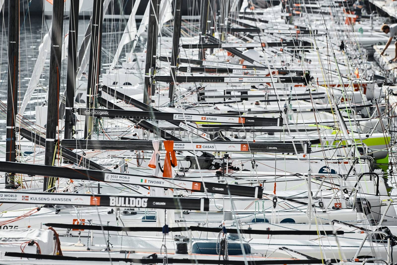 Monaco, Monte-Carlo, 18 October 2022: many sailing boats of the World Championship of J70 class participants stand in a row waiting for the wind for the stage of the sailing race. High quality photo
