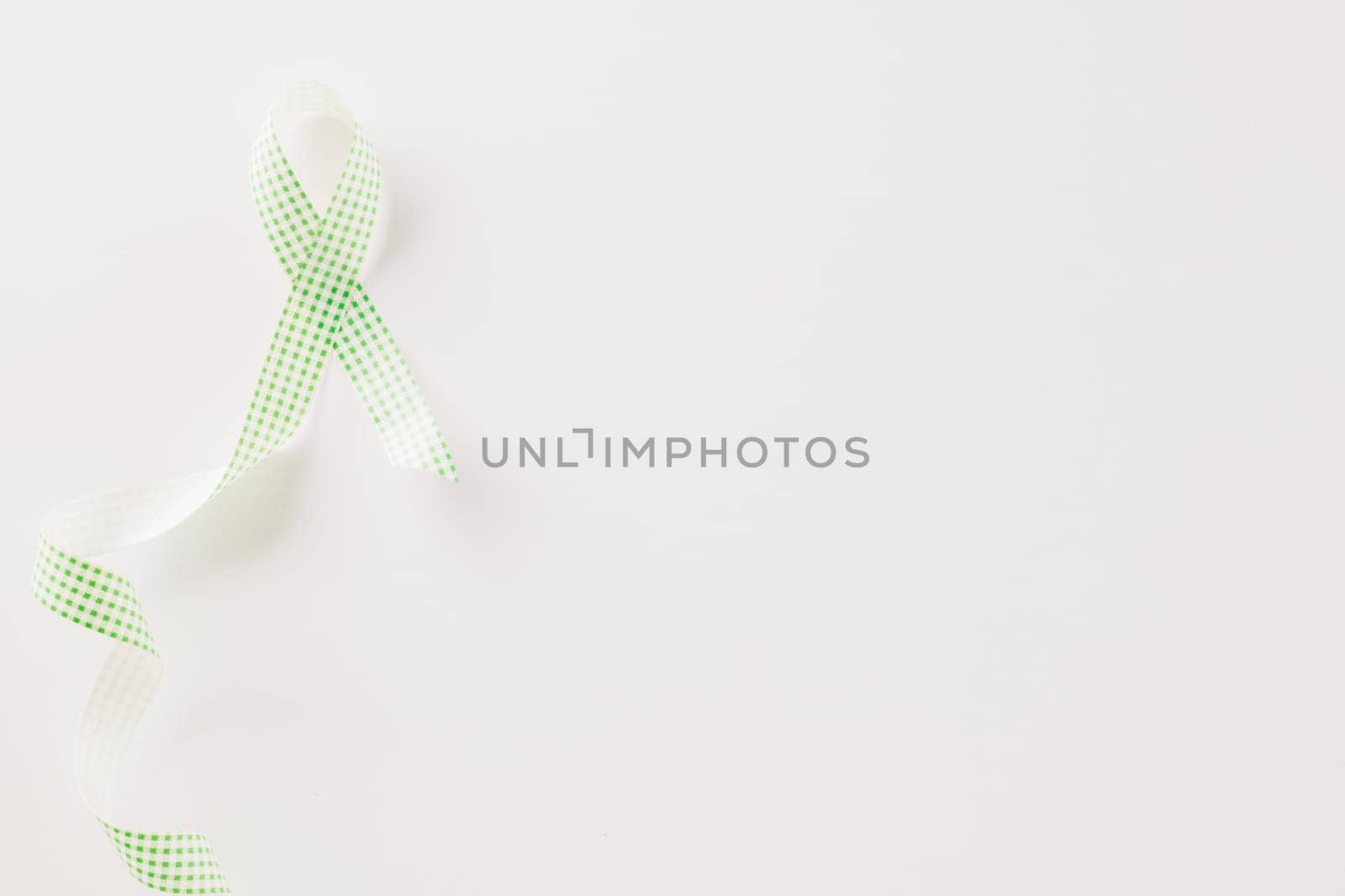 Green awareness ribbon symbol of Gallbladder and Bile Duct Cancer month by Sorapop