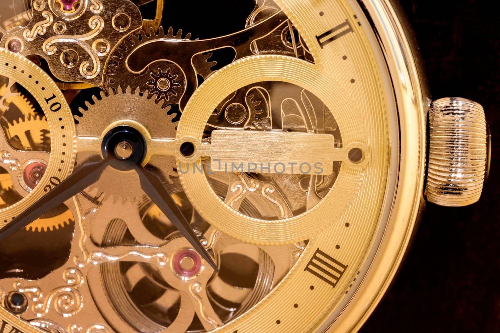 Macro shot of clockwork gears inside the watch by EdVal