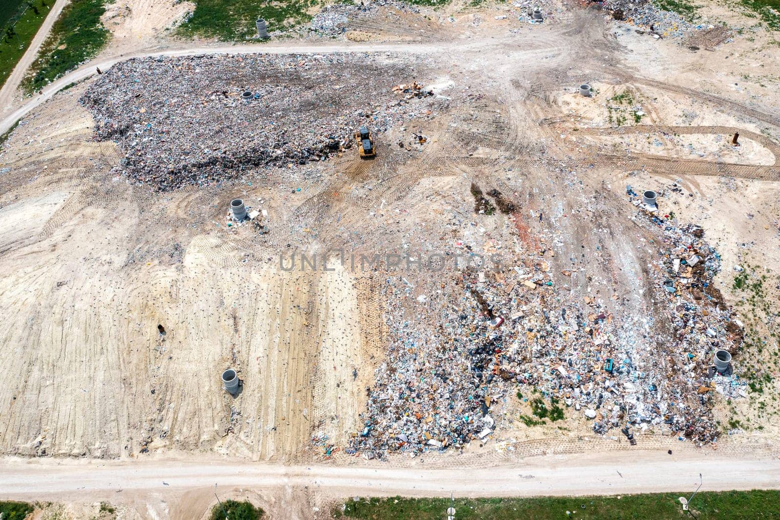 Aerial top view of a city garbage dump. Waste Disposal Facility by EdVal