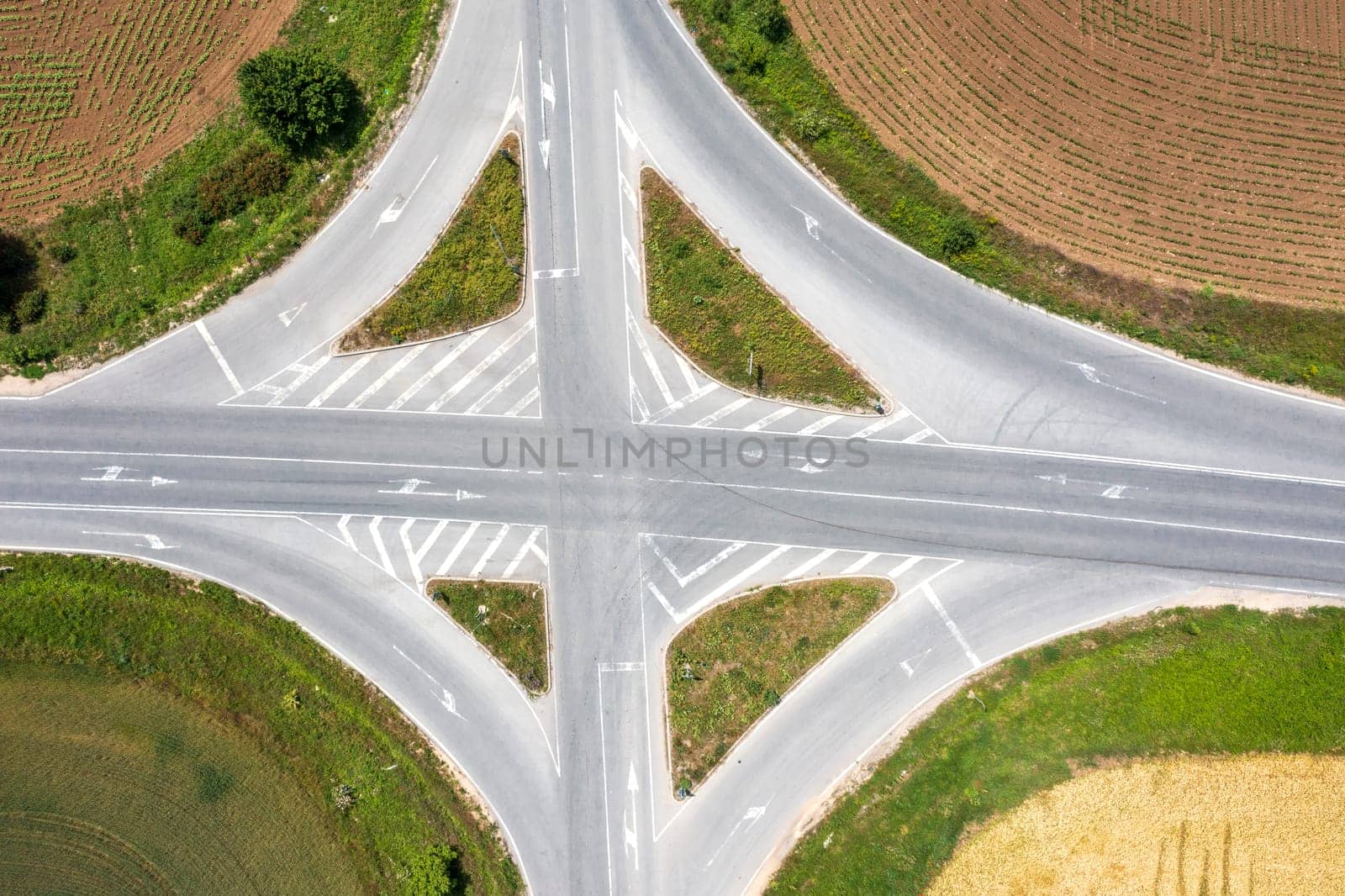 Aerial view from a drone of a part of a road junction. Transportation and infrastructure concept by EdVal