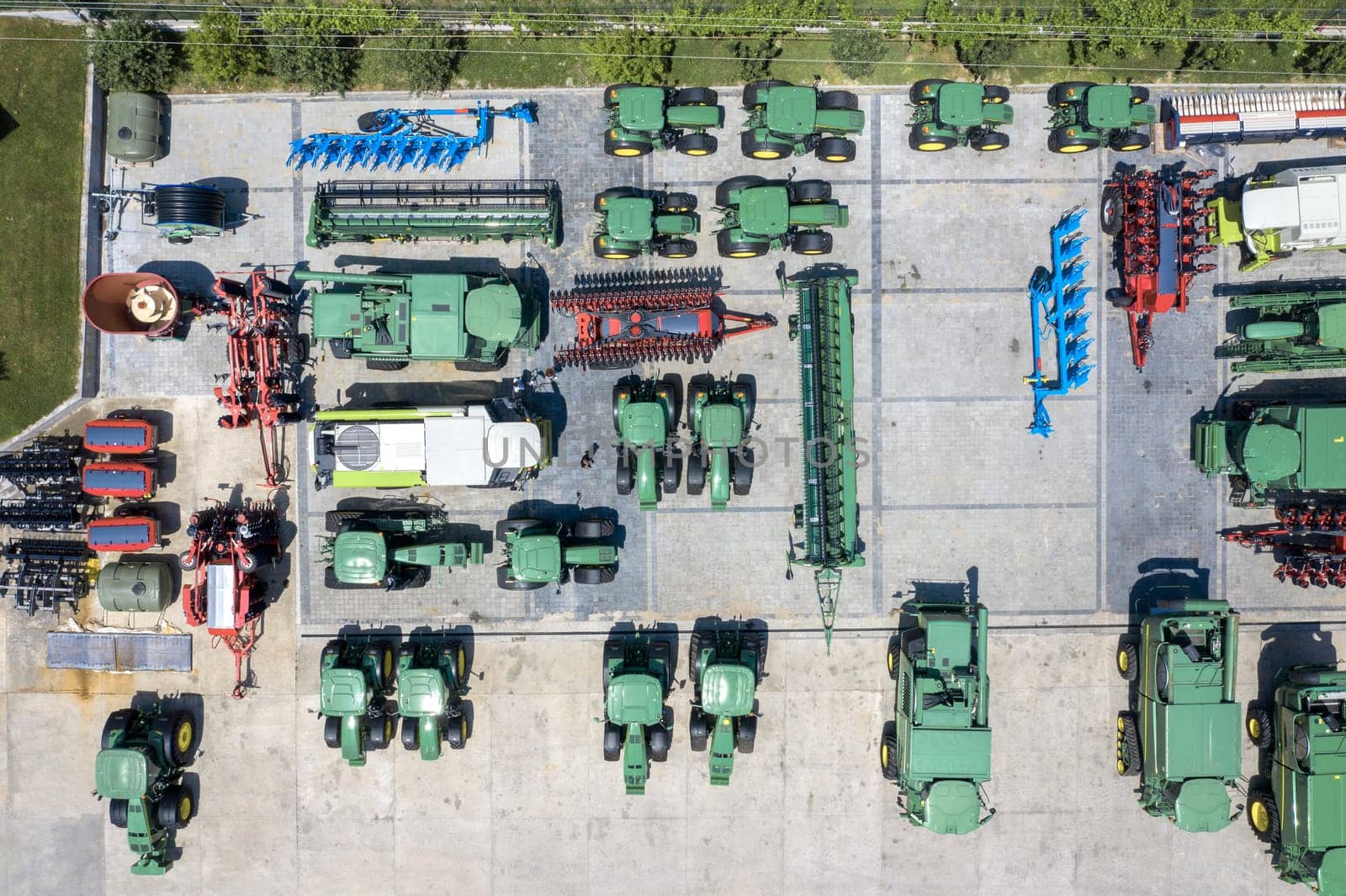 Aerial view of many different types of equipment for agriculture in storage at Targovishte town, Bulgaria by EdVal