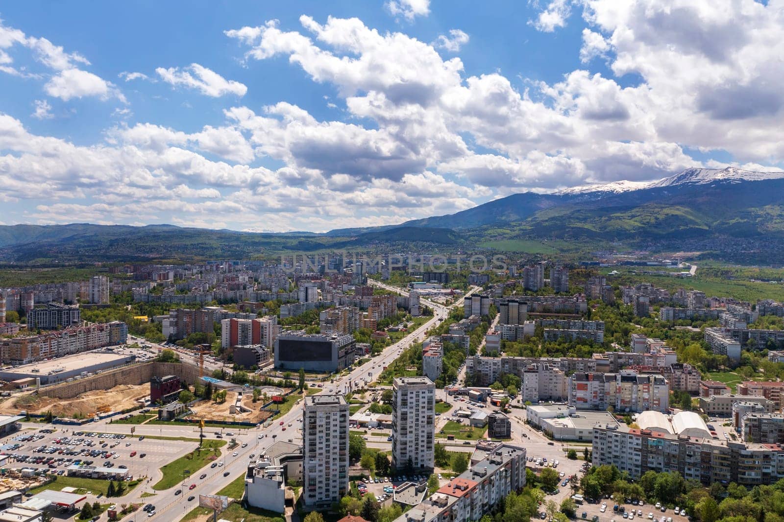 Aerial view from a drone of a city next to the mountain, Sofia Bulgaria by EdVal