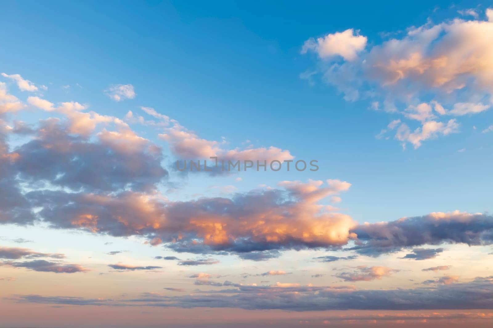 colorful clouds in the sky. Amazing view on the dramatic sunset sky by EdVal