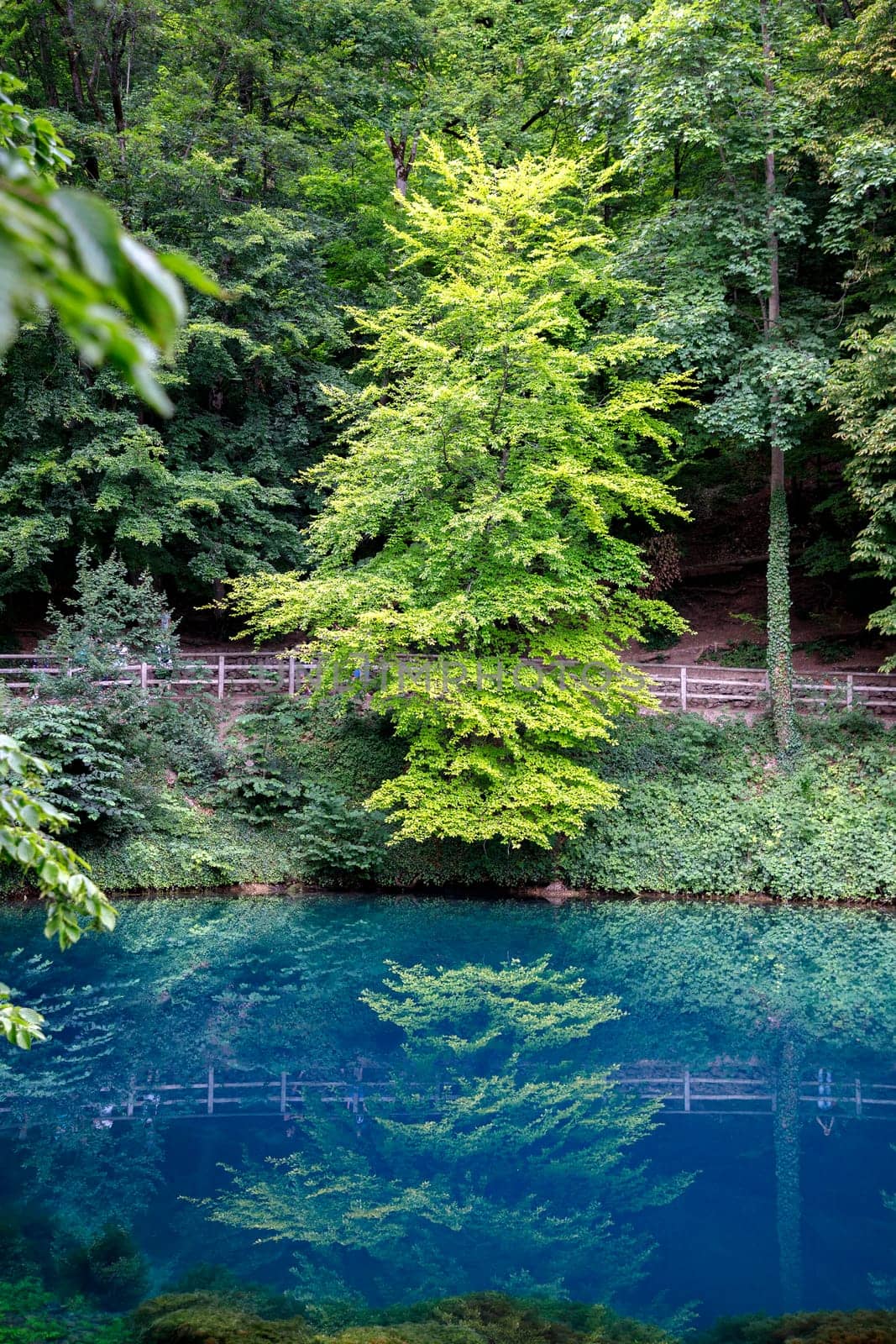 Beautiful blue, green lake Blautopf in Blaubeuren, Germany